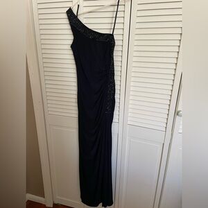 Besty and Adam’s dress, size 6, color is navy blue